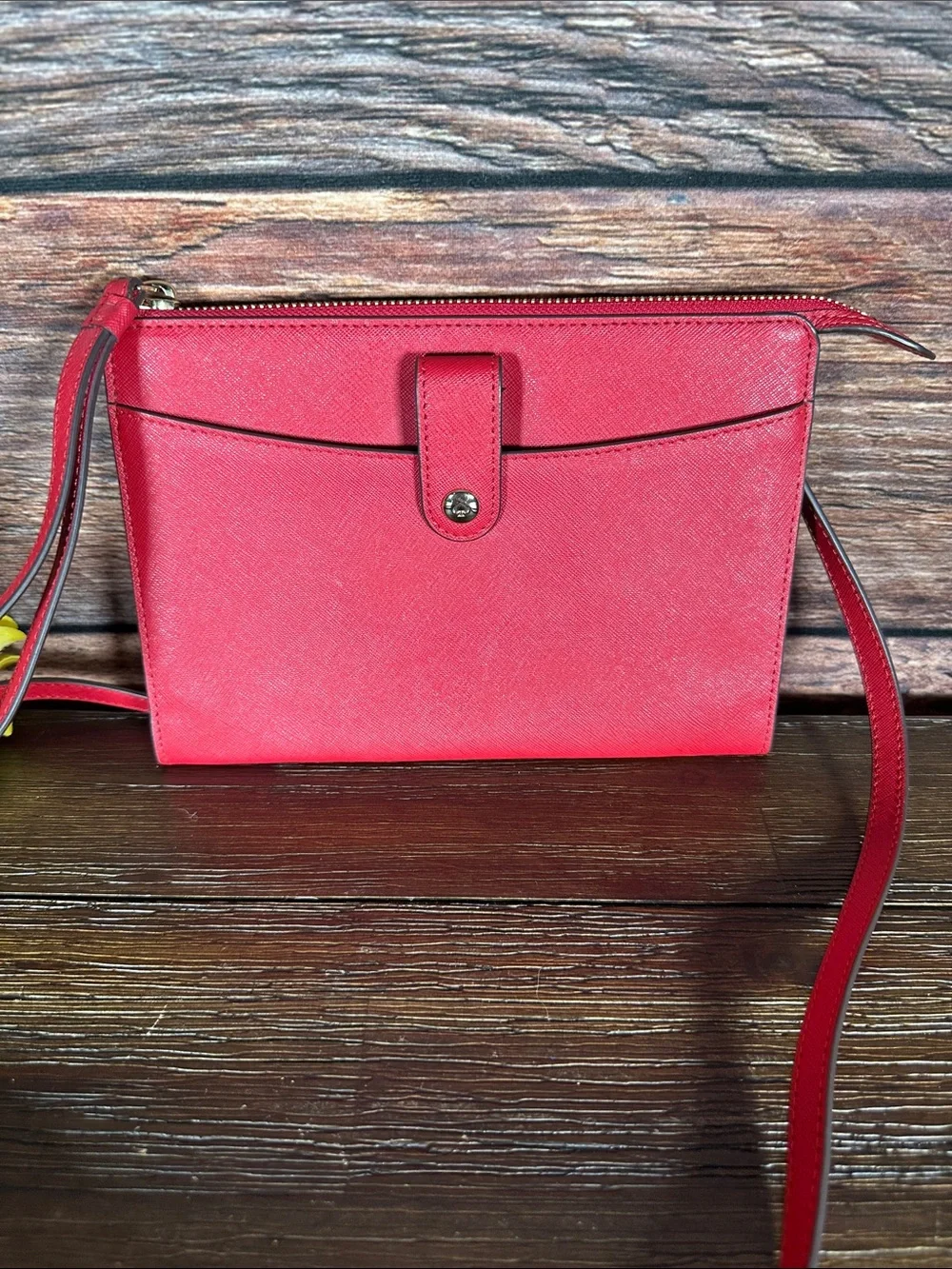 Kate Spade Laurel Way crossbody/clutch/wristlet bag in a vibrant rooster red